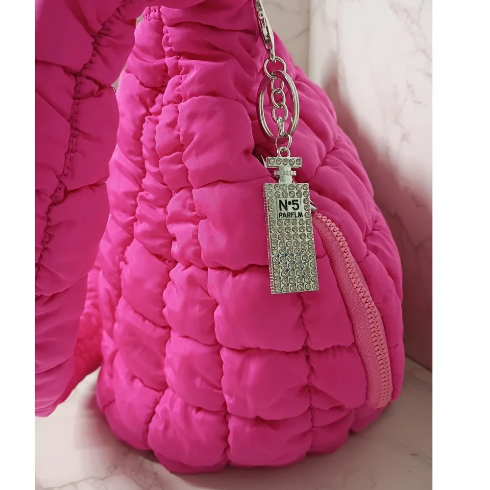 Hot Pink Quilted Puffer Hobo Bag & Clinque Striped Cosmetic Bag